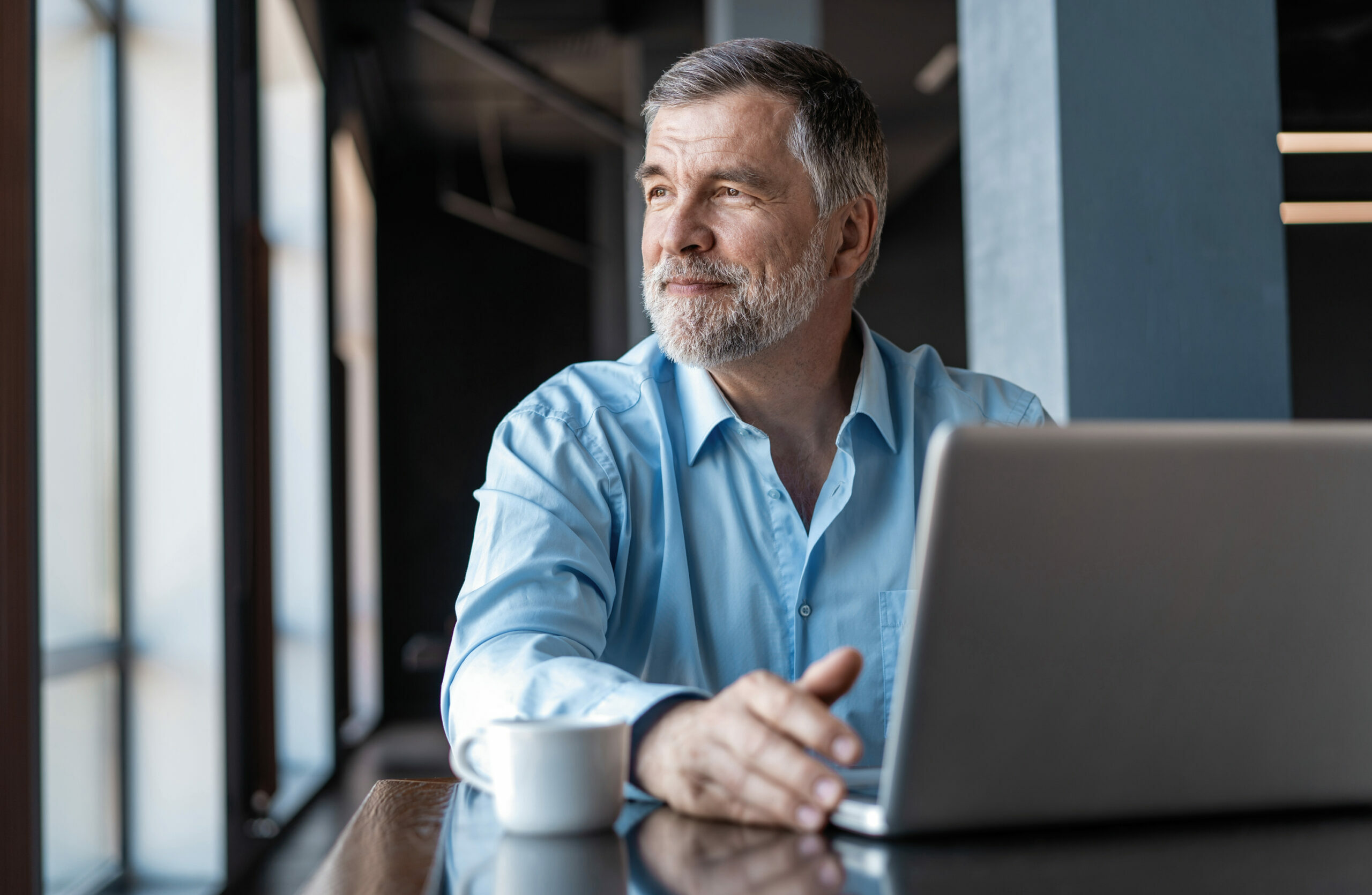 Elder gentleman on laptop