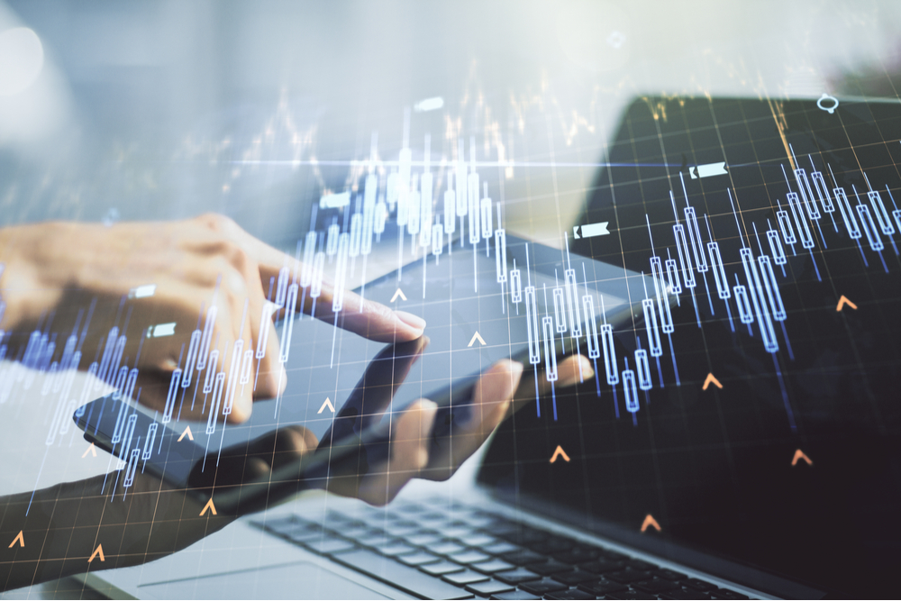 Abstract creative financial chart with world map with finger clicks on a digital tablet