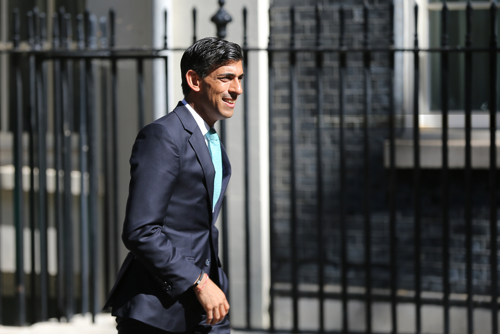 British chancellor, Rishi Sunak, walking along Downing Street